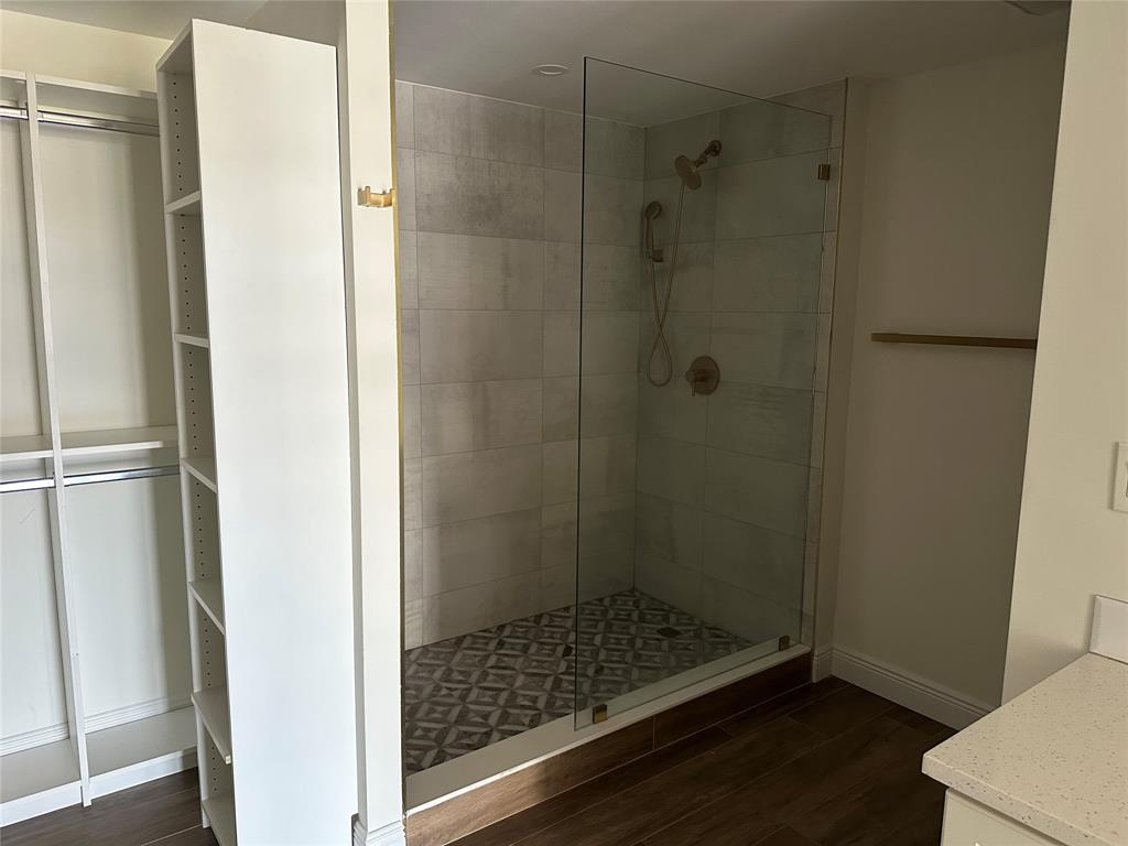 3550 Galt Ocean Drive, Unit 1907 Fort Lauderdale, FL 33308 - Photo 16 of 28 a bathroom with a glass shower door