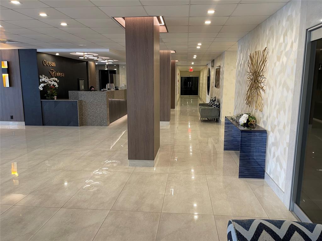 3550 Galt Ocean Drive, Unit 1907 Fort Lauderdale, FL 33308 - Photo 25 of 28 a view of a hallway with kitchen view and living room view