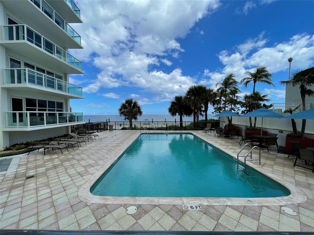 3550 Galt Ocean Drive, Unit 1907 Fort Lauderdale, FL 33308 - Photo 27 of 28 a view of a swimming pool with sitting area