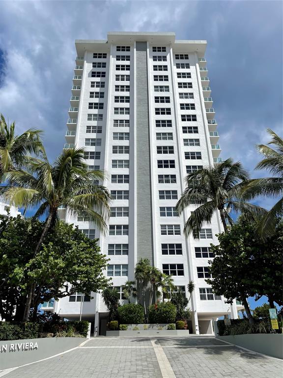 3550 Galt Ocean Drive, Unit 1907 Fort Lauderdale, FL 33308 - Photo 4 of 28 a front view of a building with palm tree