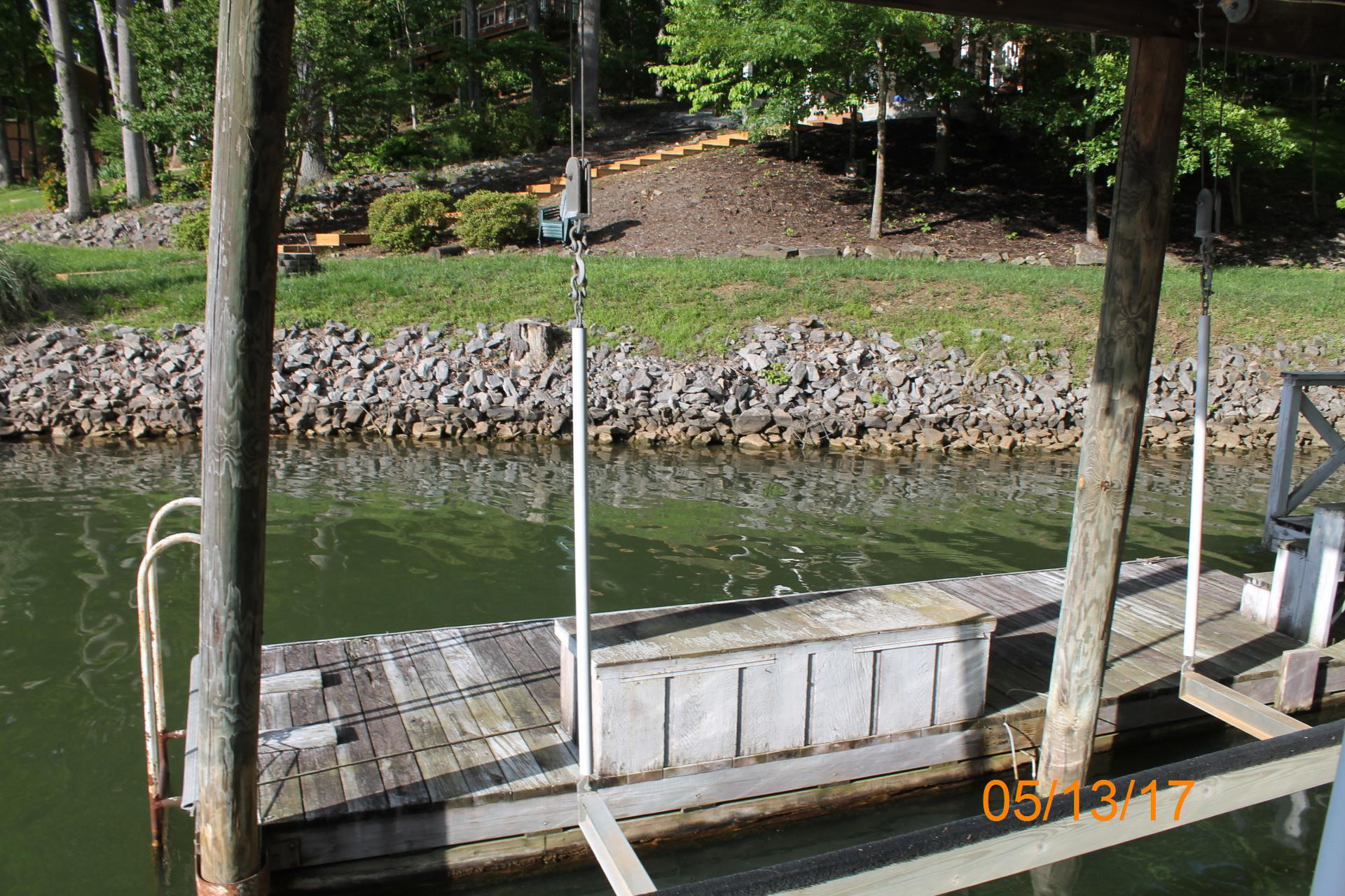 295 Highland Lake Road Union Hall, VA 24176 - Photo 6 of 17 a view of a wooden deck with a yard