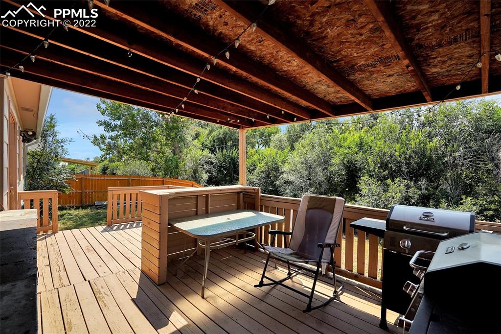 629 Blossom Field Road Fountain, CO 80817 - Photo 24 of 25 a view of porch with a table and chairs