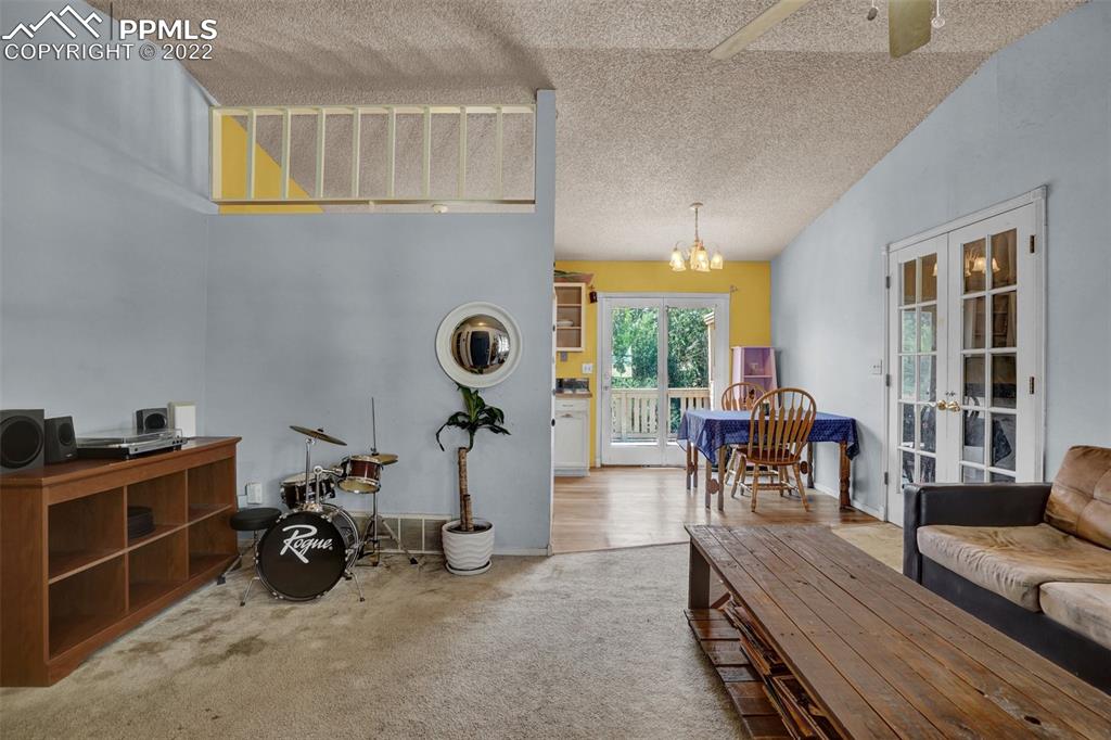 629 Blossom Field Road Fountain, CO 80817 - Photo 7 of 25 a view of a dining room with furniture window and outside view