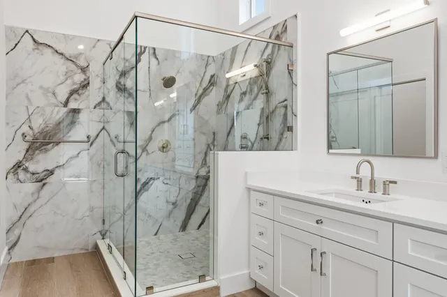 an empty room with wooden floor