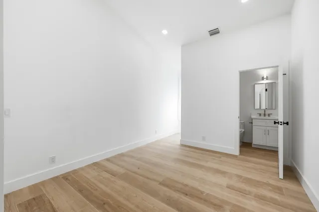 a view of a livingroom with wooden floor