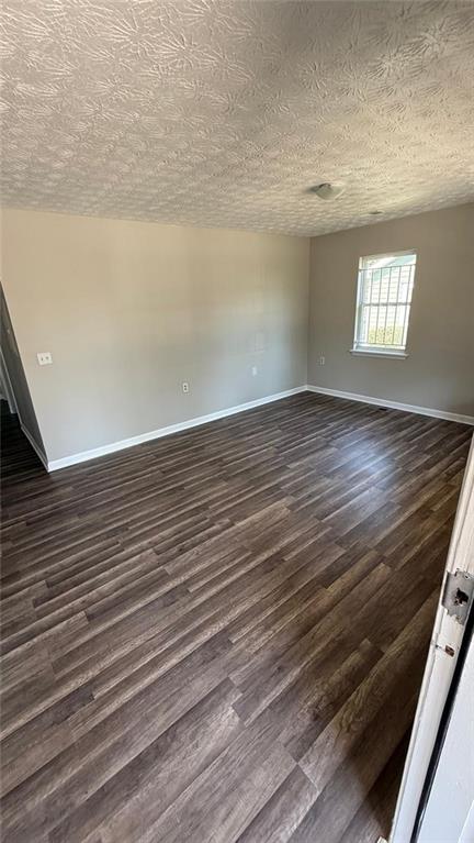 73 Polar Rock Road Southwest Atlanta, GA 30315 - Photo 15 of 16 a view of an empty room and window