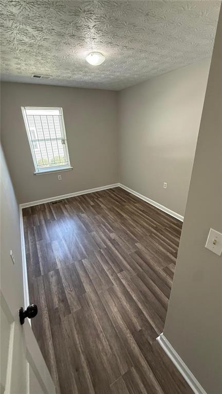 73 Polar Rock Road Southwest Atlanta, GA 30315 - Photo 9 of 16 a view of an empty room and window