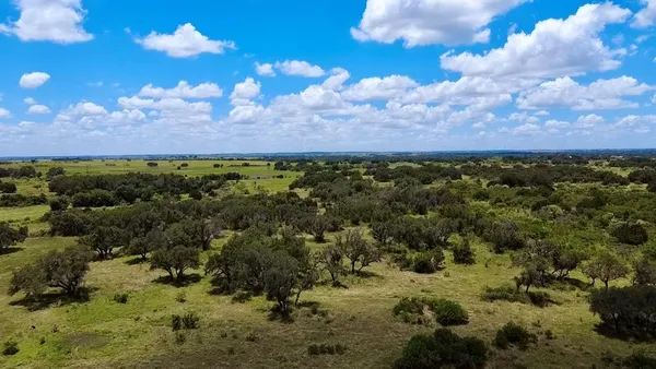 a view of a yard with an outdoor space