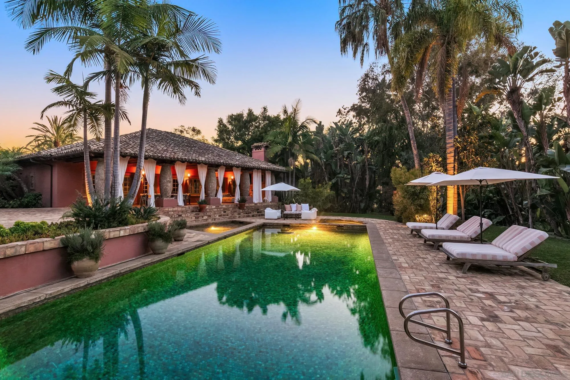 17116 Paseo Hermosa Rancho Santa Fe, CA 92067 - Photo 1 of 59 a swimming pool with outdoor seating and yard