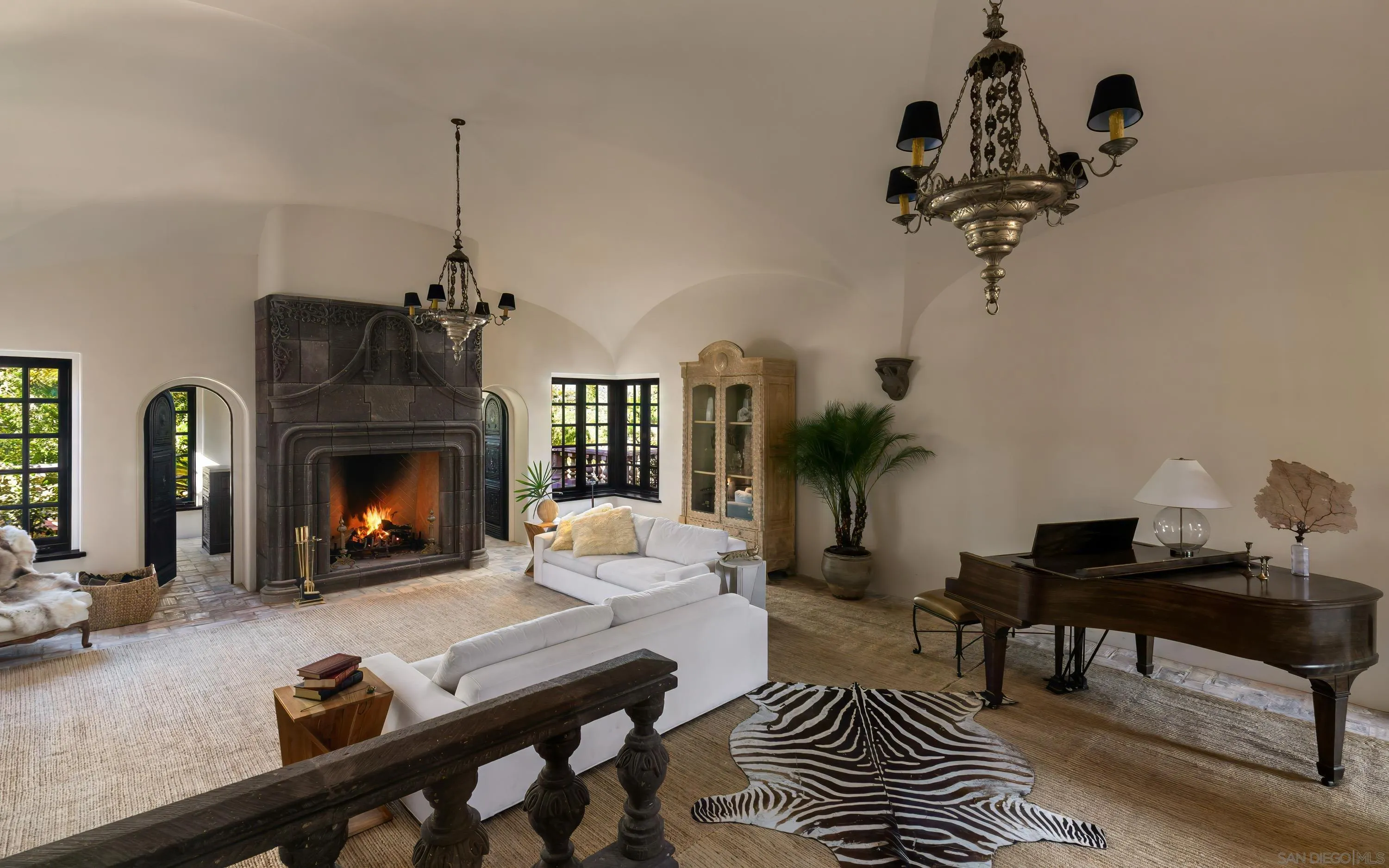 17116 Paseo Hermosa Rancho Santa Fe, CA 92067 - Photo 13 of 59 a living room with furniture and a fireplace
