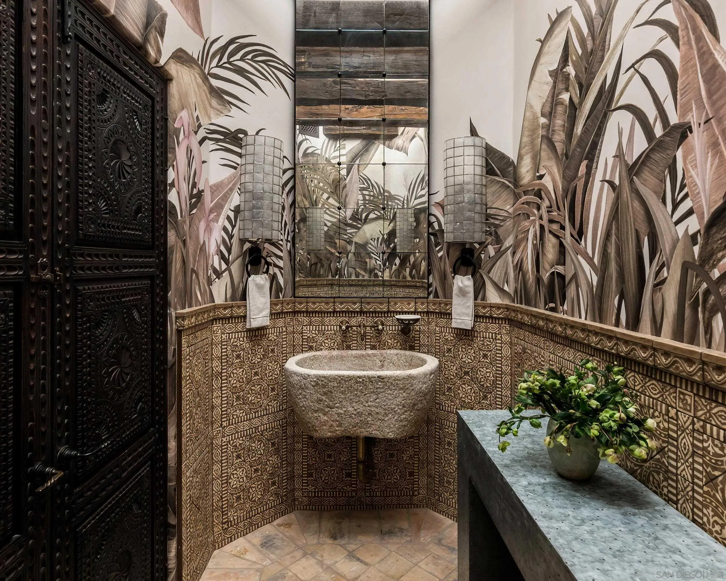 17116 Paseo Hermosa Rancho Santa Fe, CA 92067 - Photo 15 of 59 a bathroom with a sink and a mirror