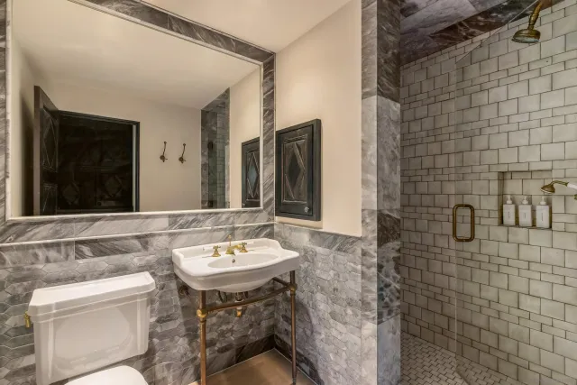 a bedroom with a bed and a closet