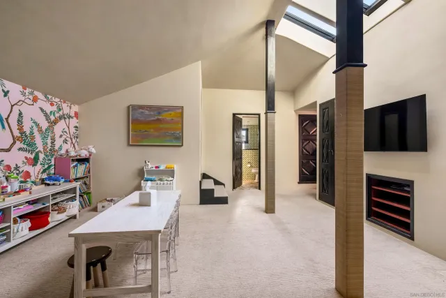 a bathroom with a toilet sink and a window