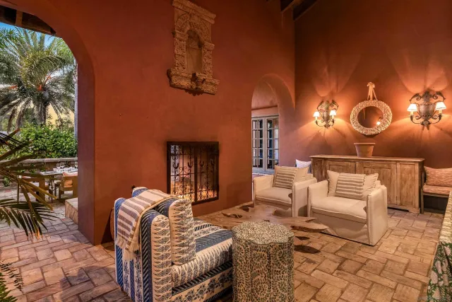 a view of a chairs and table in the patio