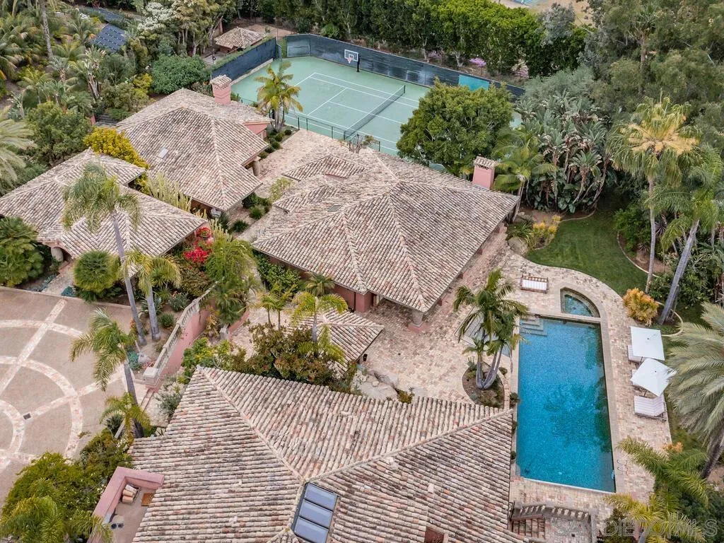 17116 Paseo Hermosa Rancho Santa Fe, CA 92067 - Photo 33 of 59 an aerial view of a house a garden and lake view