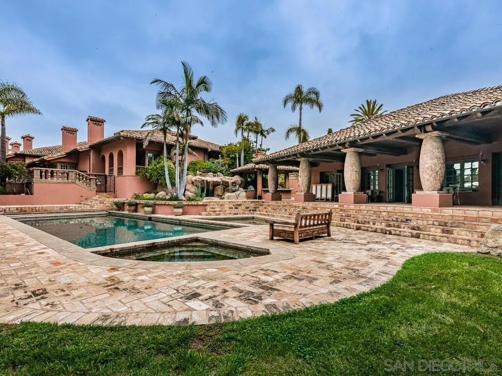 17116 Paseo Hermosa Rancho Santa Fe, CA 92067 - Photo 40 of 59 a front view of a house with garden