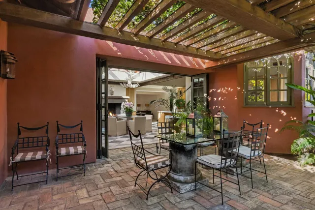 a bedroom with furniture and a window