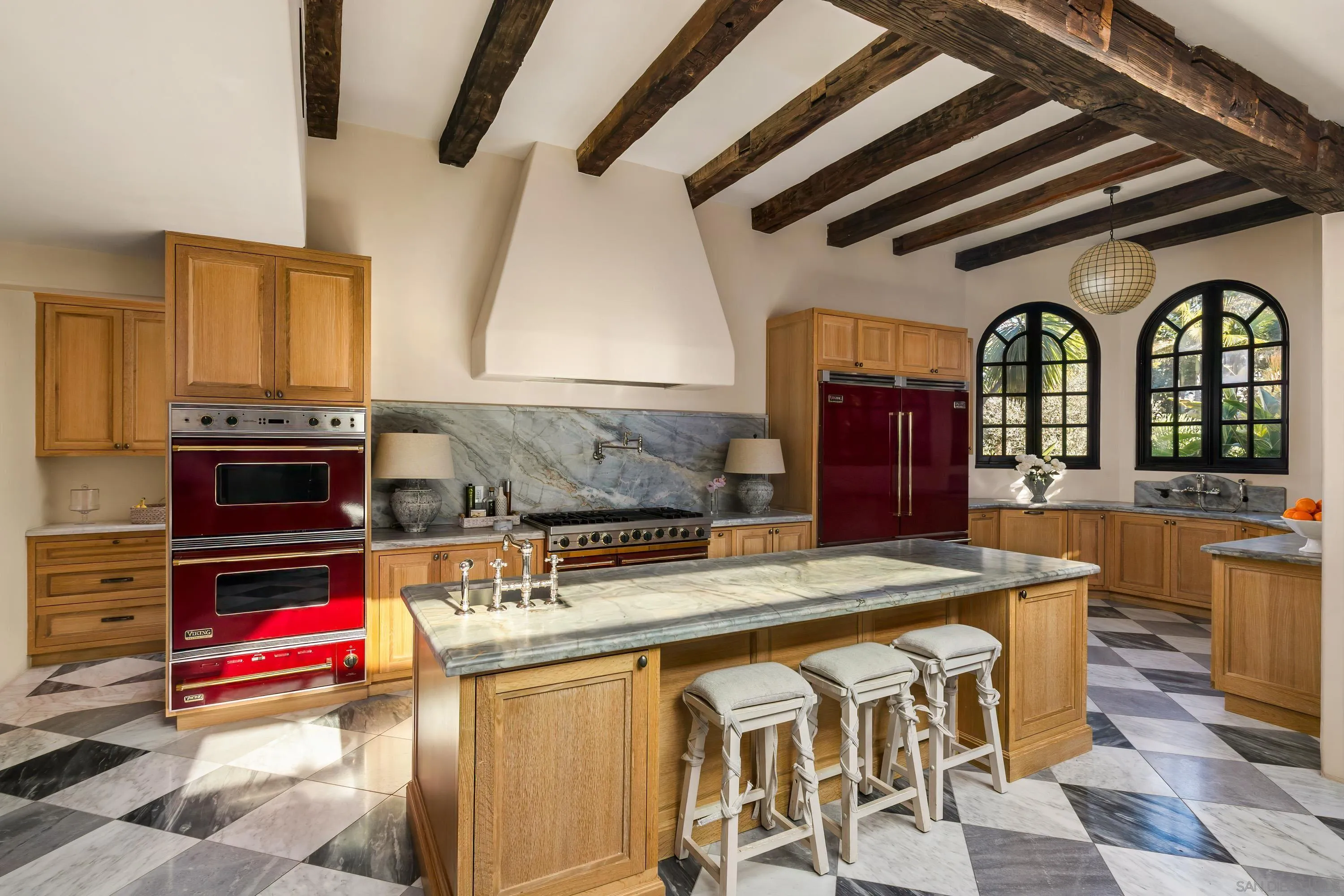 17116 Paseo Hermosa Rancho Santa Fe, CA 92067 - Photo 52 of 59 a kitchen with stainless steel appliances granite countertop a stove and a sink