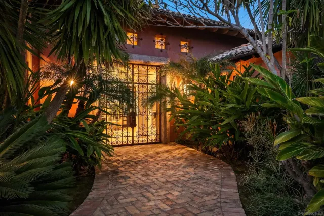 a view of a hallway with a outdoor space