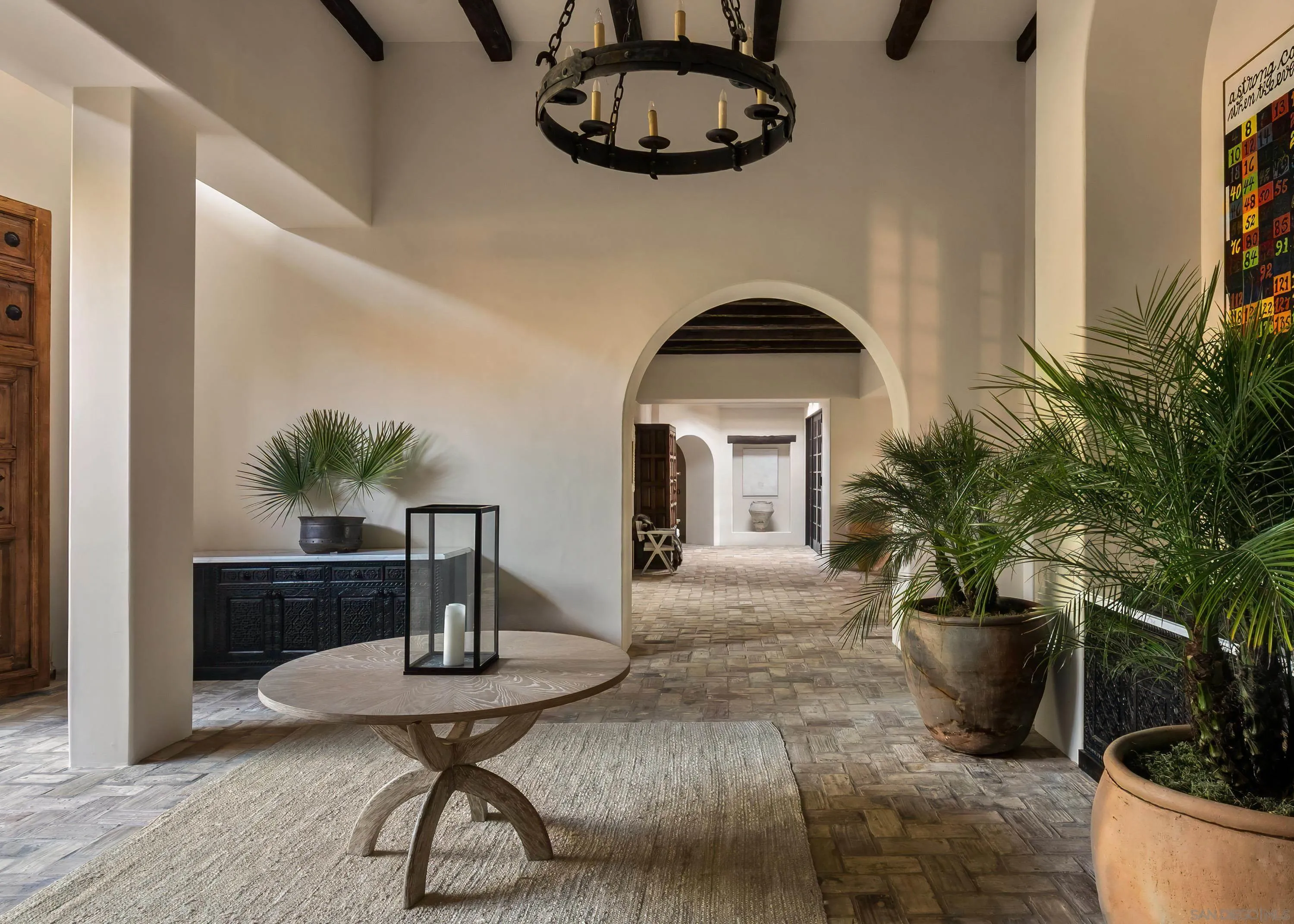 17116 Paseo Hermosa Rancho Santa Fe, CA 92067 - Photo 9 of 59 a living room with furniture potted plant and a window