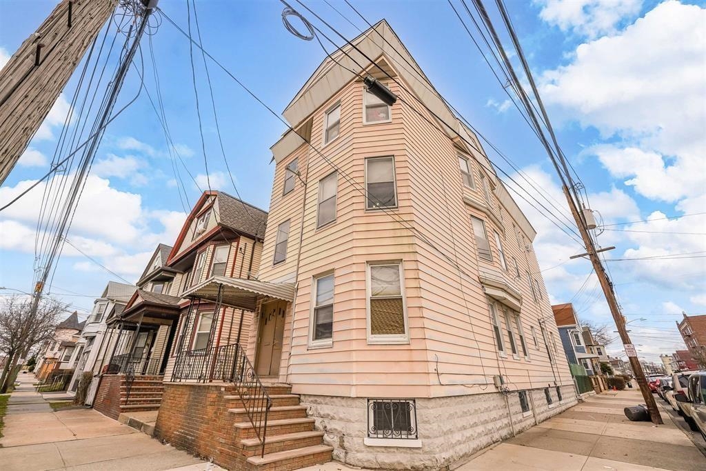 65 Halstead Street, Unit 2 Kearny, NJ 07032 - Photo 16 of 16 a view of a large white building