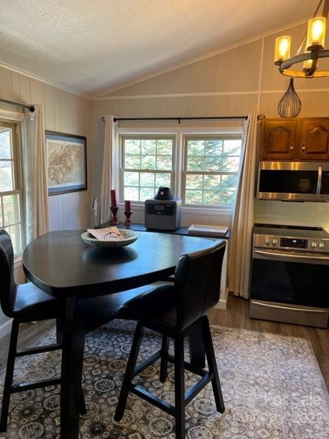 200 Golfwatch Road Canton, NC 28716 - Photo 19 of 38 a view of a dining room with furniture window and outside view