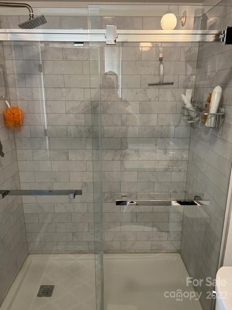 200 Golfwatch Road Canton, NC 28716 - Photo 8 of 38 a bathroom with a shower