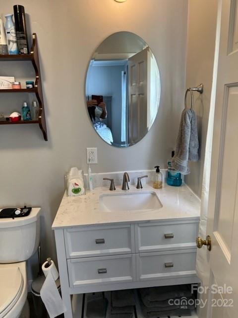 200 Golfwatch Road Canton, NC 28716 - Photo 10 of 38 a bathroom with a sink and a mirror