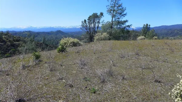 a view of a mountain with an outdoor space
