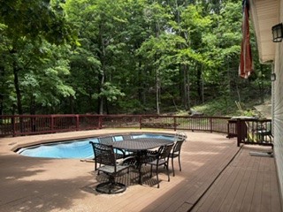 12883 Nickels Road West Fork, AR 72774 - Photo 21 of 26 Above ground pool surrounded by large deck area.