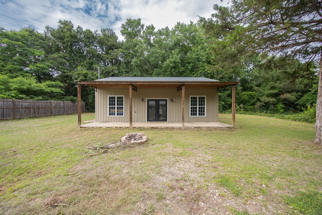 246 Sunnyside Church Road Pine Mountain, GA 31822 - Photo 22 of 26 a view of a house with backyard and trees