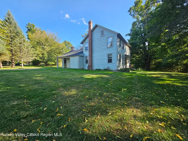 a view of a house with a big yard