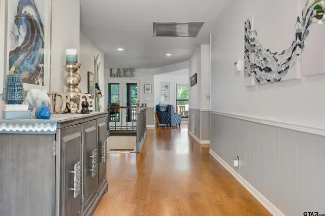 a hallway with wooden floor