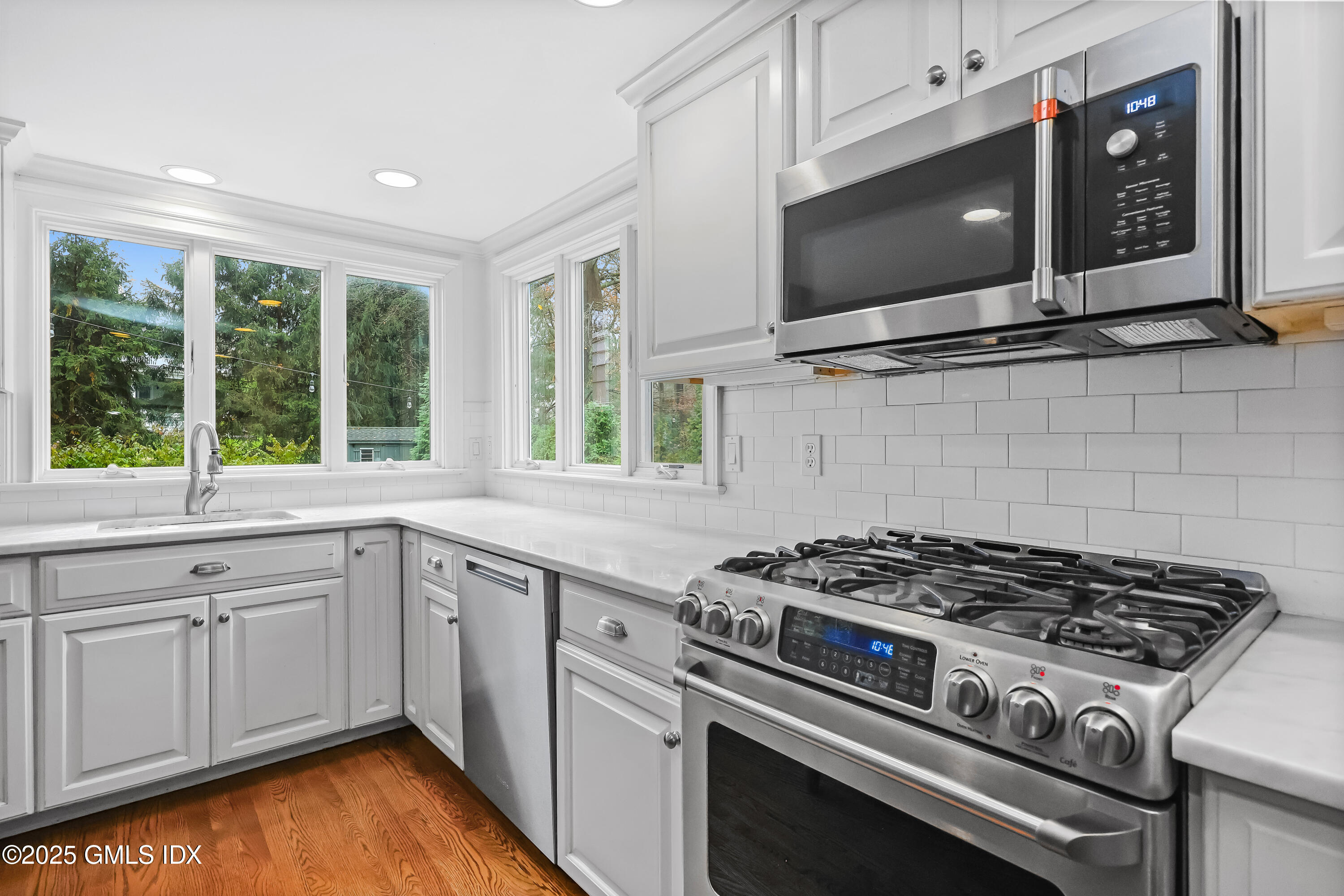 22 Summit Road Riverside, CT 06878 - Photo 3 of 44 a kitchen with a stove and a microwave