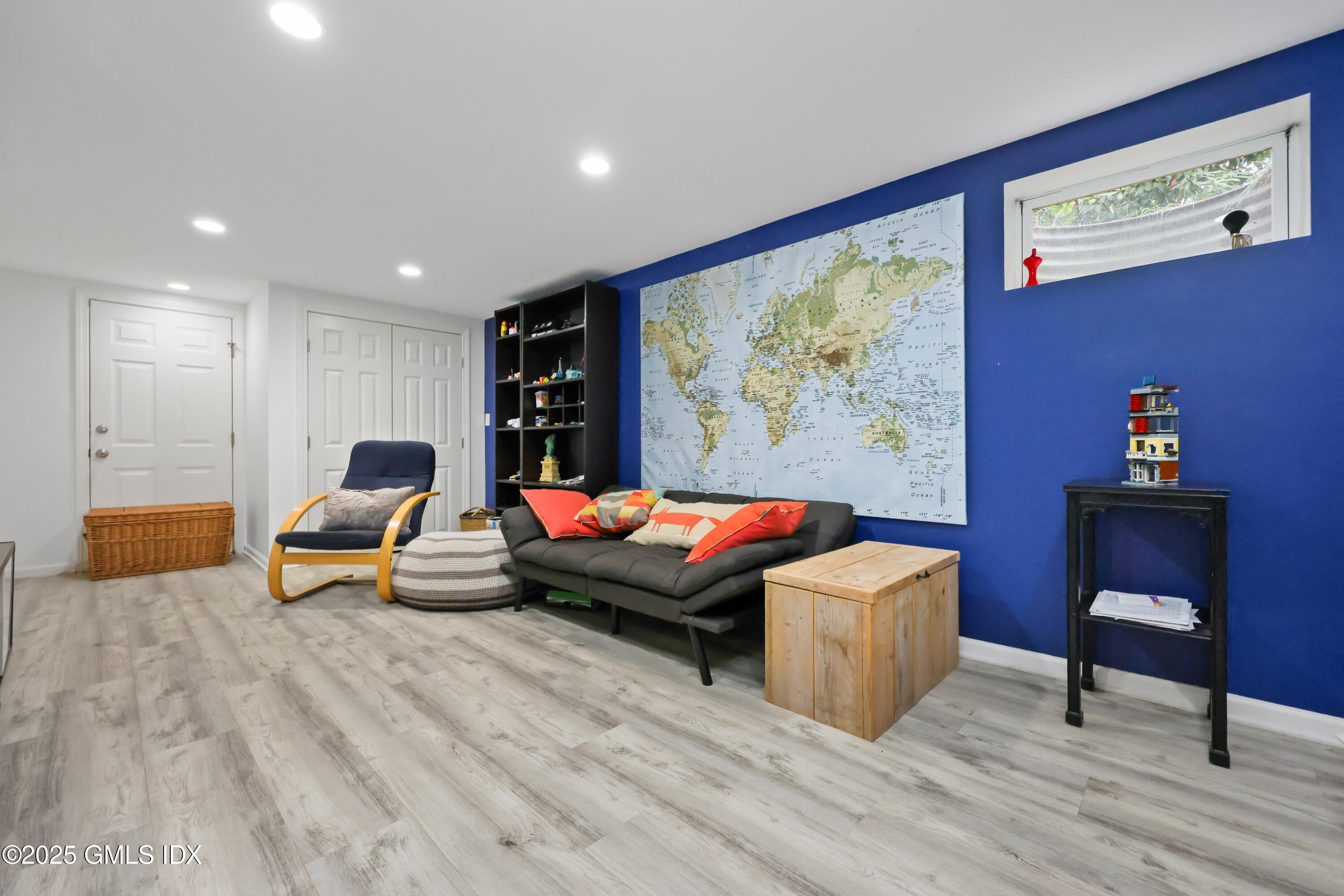 22 Summit Road Riverside, CT 06878 - Photo 31 of 44 a living room with furniture and a wooden floor