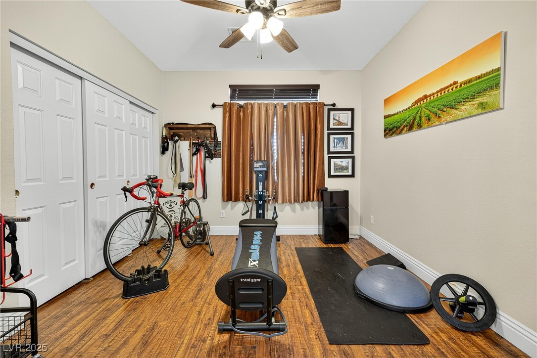 980 Upper Meadows Place Henderson, NV 89052 - Photo 26 of 58 Exercise room featuring wood finished floors and ceiling fan