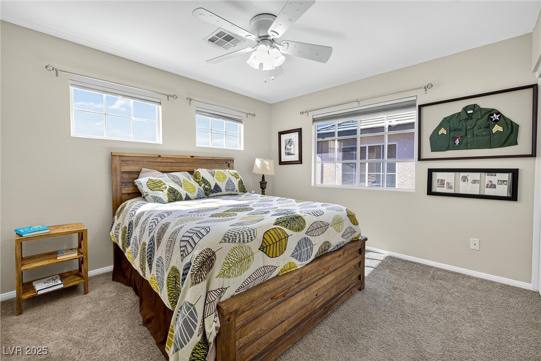 980 Upper Meadows Place Henderson, NV 89052 - Photo 40 of 58 Bedroom with carpet flooring and ceiling fan