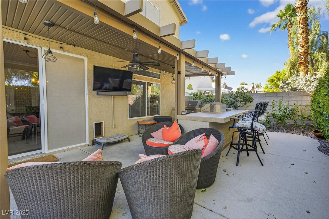 980 Upper Meadows Place Henderson, NV 89052 - Photo 45 of 58 View of patio with exterior kitchen and ceiling fan