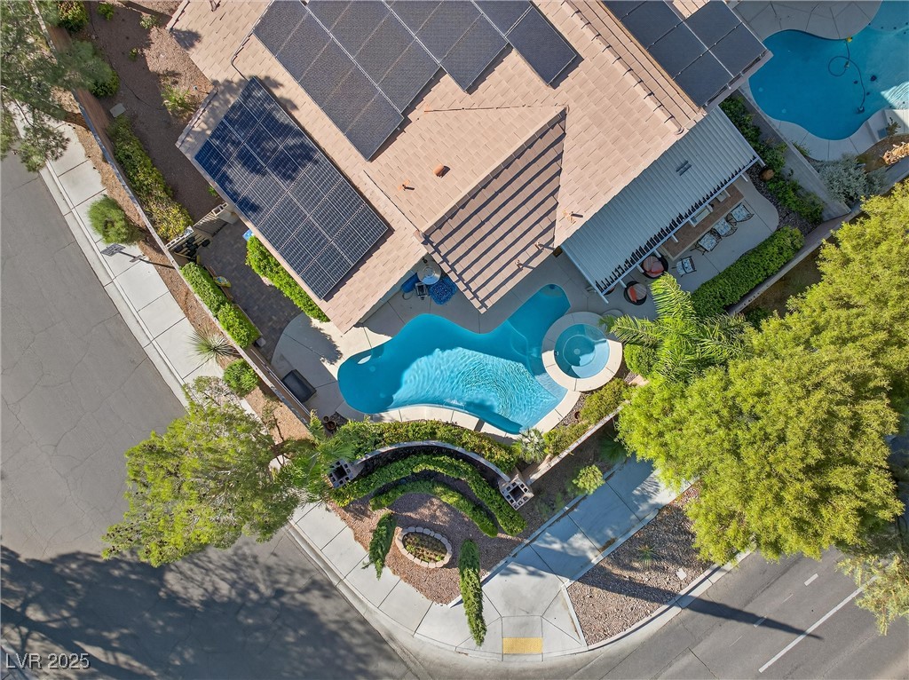 980 Upper Meadows Place Henderson, NV 89052 - Photo 55 of 58 Aerial view of property and surrounding area with a pool