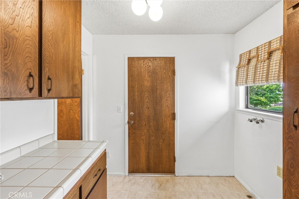 37295 Oak View Road Yucaipa, CA 92399 - Photo 19 of 59 a view of a hallway with windows