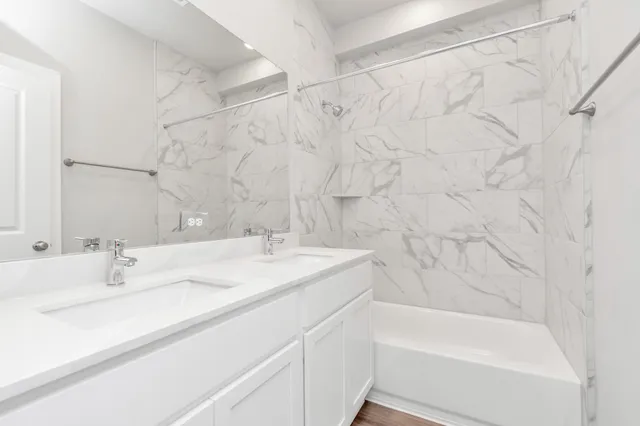 a bathroom with a sink and a bathtub