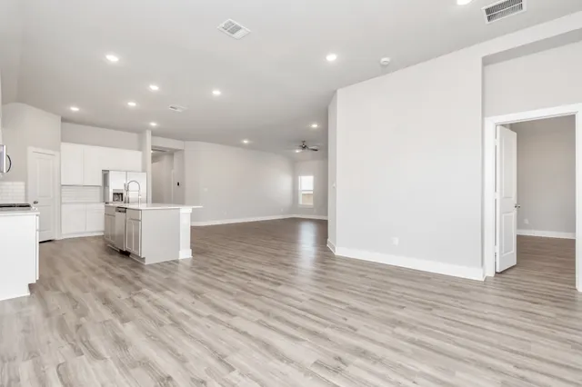 a view of kitchen with wooden floor