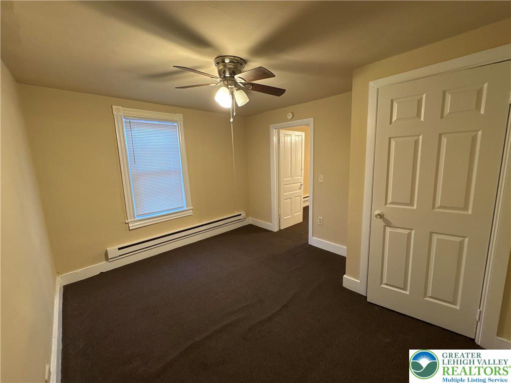 229 West Fairview Street Bethlehem, PA 18018 - Photo 15 of 17 an empty room with windows and fan