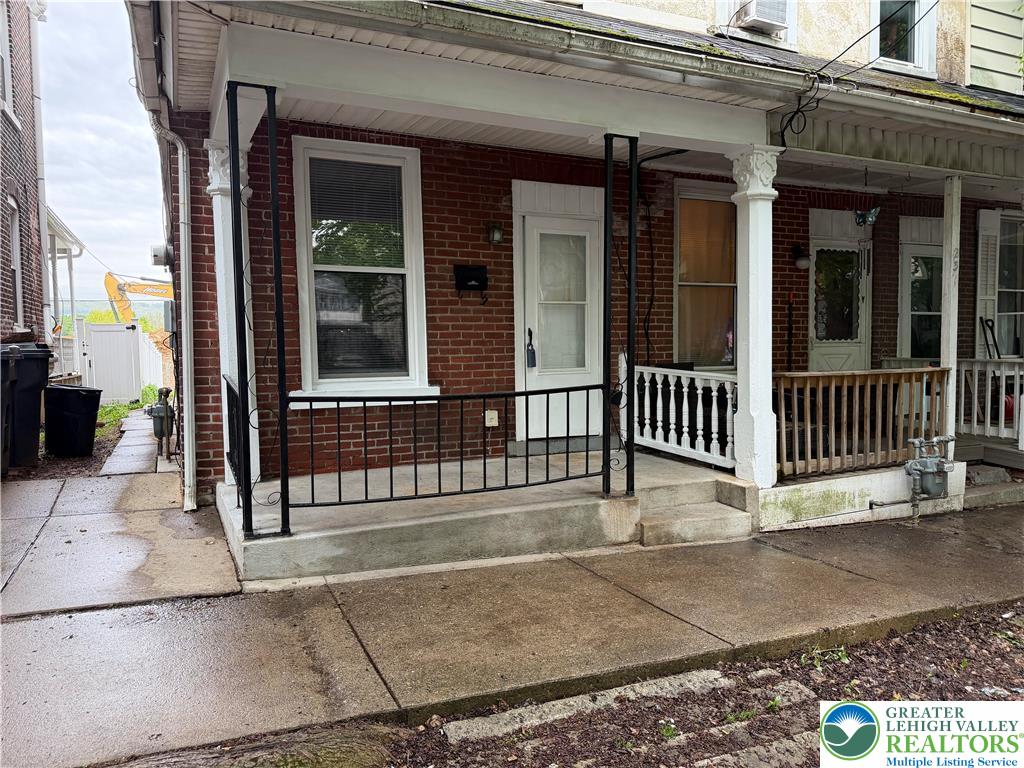 229 West Fairview Street Bethlehem, PA 18018 - Photo 3 of 17 a view of a brick house with large windows