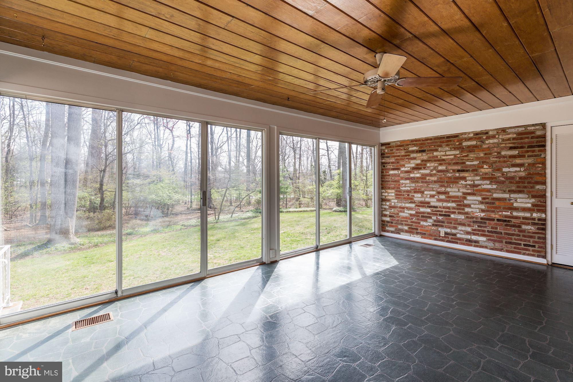 9301 Burning Tree Road Bethesda, MD 20817 - Photo 11 of 30 Sun Room off Family Room