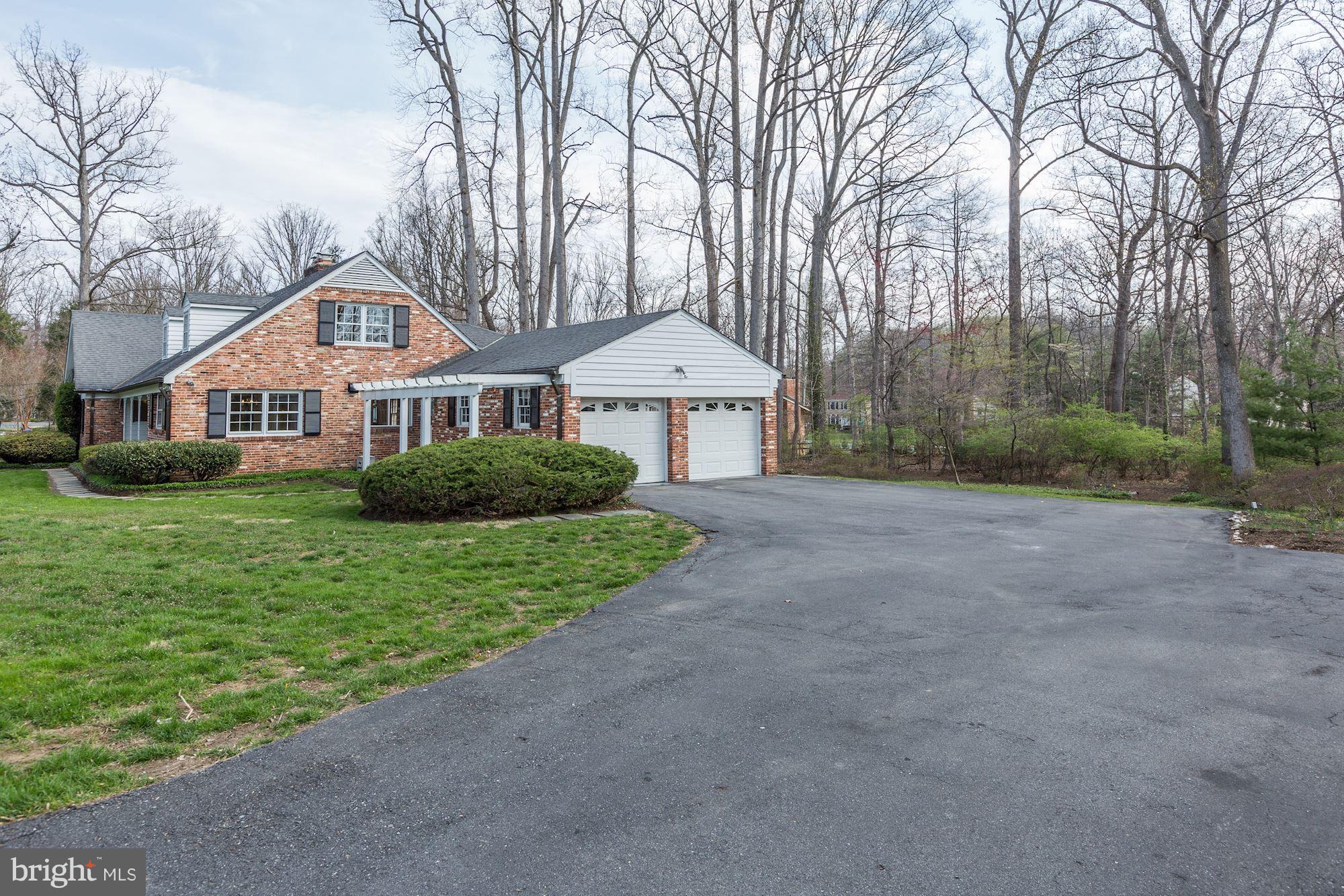 9301 Burning Tree Road Bethesda, MD 20817 - Photo 25 of 30 Driveway and 2 Car Garage
