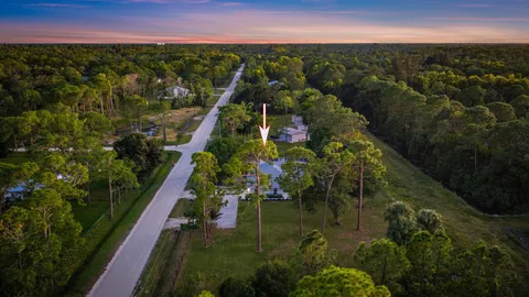 a view of a lake with a garden
