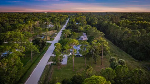 a view of a lake with a garden
