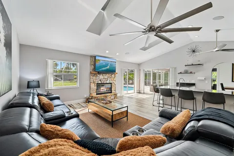 a living room with furniture and a window