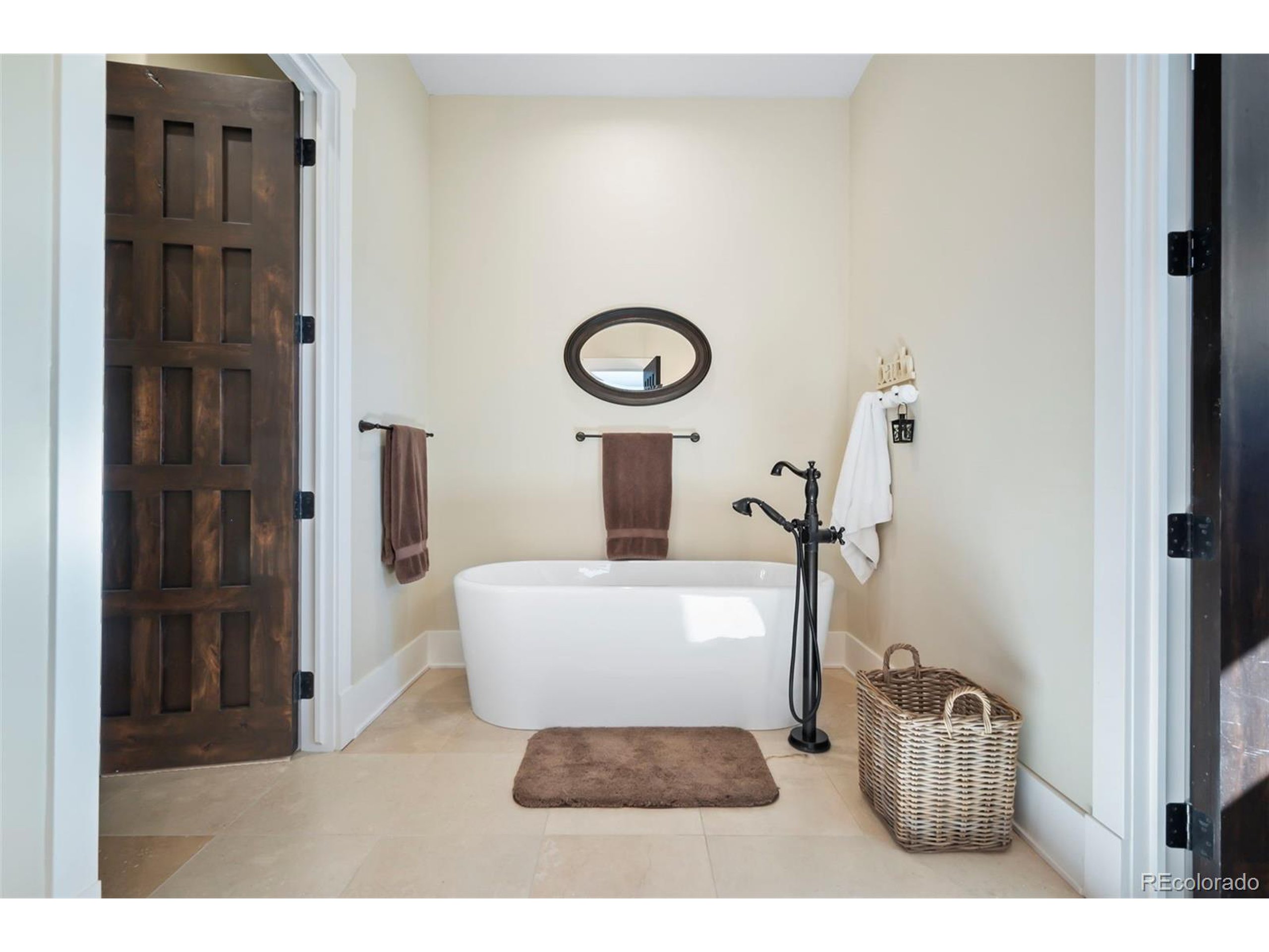4694 Settlers Ridge Road Colorado Springs, CO 80908 - Photo 15 of 43 a bathroom with a toilet